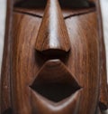 African mask in hand carved wood, ancient warrior