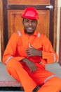 African mechanical man smiling with thumbs up. Concept of engineer or technician