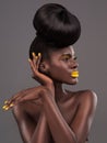 African, model and studio face with creative, beauty and cosmetic yellow lipstick. Bold, woman and skin with confidence