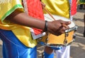 African musician playing drum in festival