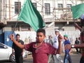 African Muslim boy holds flag in Nairobi