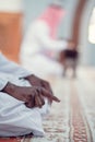 African Muslim Man Making Traditional Prayer To God While Wearing Dishdasha Royalty Free Stock Photo