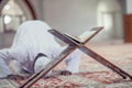 African Muslim Man Making Traditional Prayer To God While Wearing Dishdasha Royalty Free Stock Photo