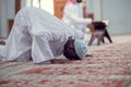 African Muslim Man Making Traditional Prayer To God While Wearing Dishdasha Royalty Free Stock Photo