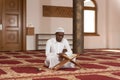 African Muslim Man Reading Holy Islamic Book Koran