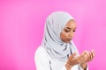 African Muslim woman makes traditional prayer to God Royalty Free Stock Photo