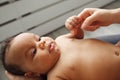 African newborn baby holding mother finger Royalty Free Stock Photo