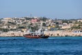 African people migrants rescued by italian authority Guardia di Finanza