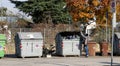 African poor guy looking in trash something to eat