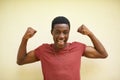 African, portrait and teenager with smile, flex and happiness for youth and cool. Student, strong and positive with Royalty Free Stock Photo