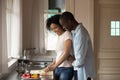 African romantic couple cooking together dinner in the kitchen Royalty Free Stock Photo