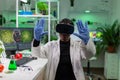 African scientist biologist conducting research using virtual reality