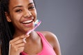 African girl washing teeth with toothbrush Royalty Free Stock Photo