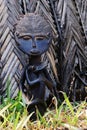 The African statuette of the Madonna nursing the infant Royalty Free Stock Photo