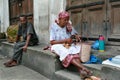 African street traders sit at the of closed Trade Rows.