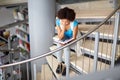 African student girl reading book at library Royalty Free Stock Photo
