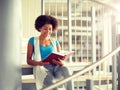 African student girl reading book at library Royalty Free Stock Photo