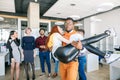 African student showing simpathy to redhaired female Royalty Free Stock Photo