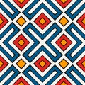 African style seamless pattern in bright colors. Ethnic and tribal motif. Repeated rhombuses abstract background. Royalty Free Stock Photo