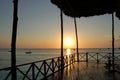African sunset on the horizon from the deck in Zanzibar