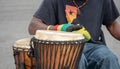 African themed drummer beating drums at a performance Royalty Free Stock Photo