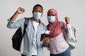 African Tourists Muslim Couple Wearing Protective Masks Showing Tickets Royalty Free Stock Photo