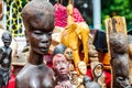 African tribal art for sale at a market stall