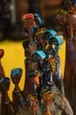 African tribal art for sale at a market stall. Royalty Free Stock Photo