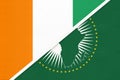 African Union and Ivory Coast national flag from textile. Africa continent vs Ivorian symbol