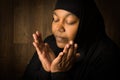 African veiled woman in prayer Royalty Free Stock Photo