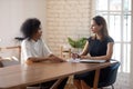 African woman passing job interview communicating with HR manager businesswoman Royalty Free Stock Photo