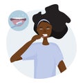 African woman brushing her tongue with a toothbrush. Open mouth with tongue and healthy clean teeth. Oral hygiene concept every d