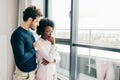 African woman calculates their domestic budget, blaming husband in a waste of money Royalty Free Stock Photo