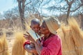 African woman carry child