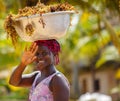 African woman carry things on her head