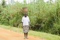 African woman carrying a basket on head