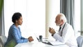 African woman consulting doctor about her medical condition Royalty Free Stock Photo