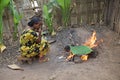 African woman is cooking