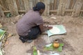 African woman is cooking