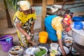 African woman cooking traditional food on street Royalty Free Stock Photo