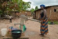 African woman fetching water