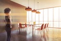 African woman in gray dining room Royalty Free Stock Photo