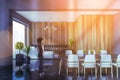 African woman in gray and wooden dining room Royalty Free Stock Photo