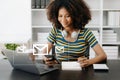 African Woman hands using Laptop, tablet typing on keyboard and surfing the internet with email icon, email marketing concept, Royalty Free Stock Photo