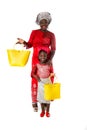 African woman with little girl in traditional clothing with tote bags.Isolated Royalty Free Stock Photo