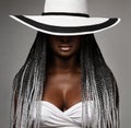 African Woman with Long Braids Hair. Black and White Concept. Beauty Model in Big Hat hidden Face. Afro Hairstyle and Lips Makeup