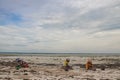 African woman from Mozambique at the shore of Indian Ocean