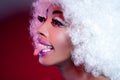 African Woman With Pierced Tongue And Wig Royalty Free Stock Photo