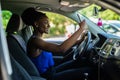 African woman posing for selfie inside her car Royalty Free Stock Photo