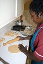 African Woman prepares Chapati